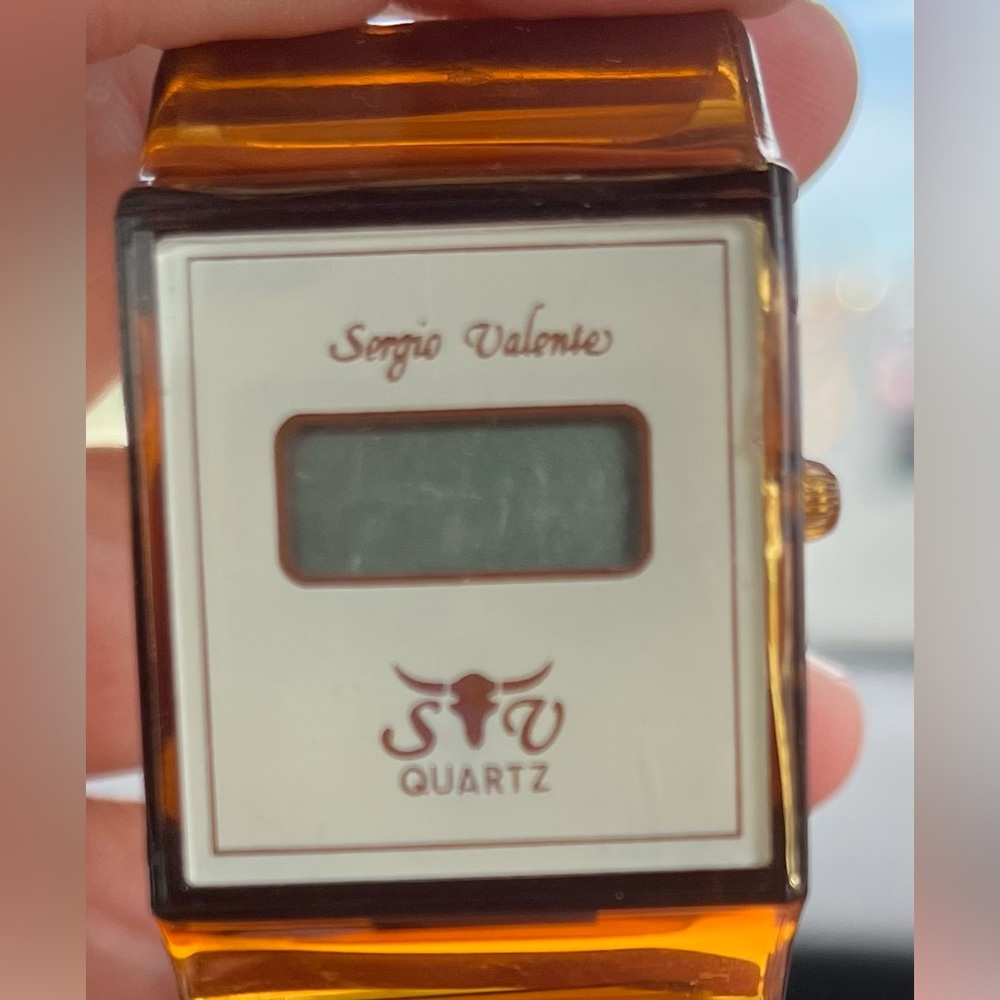 Rare vintage 1980s Sergio Valente Bangle quartz watch new!